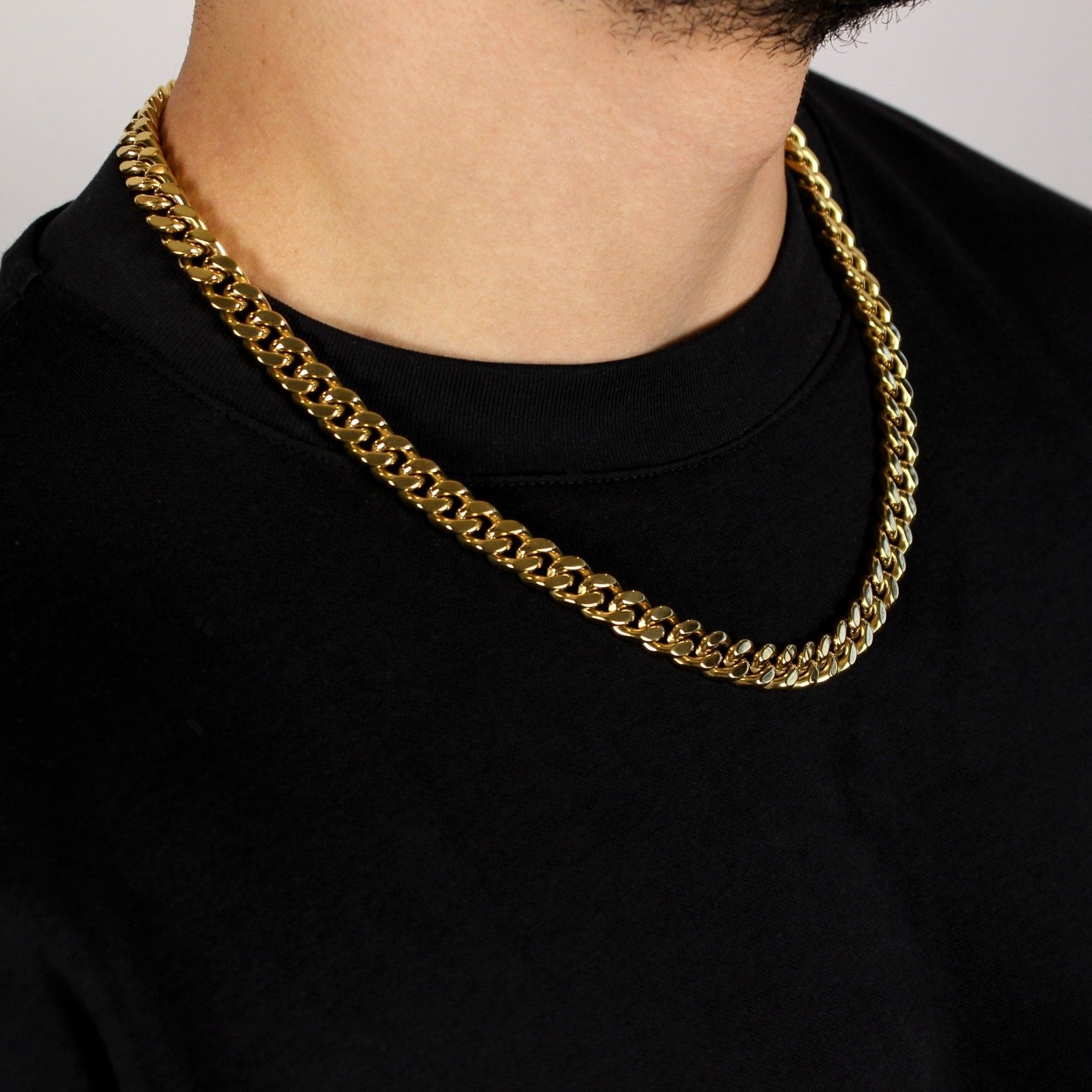 This is a close up shot of our 10mm cuban link chain on our models neck