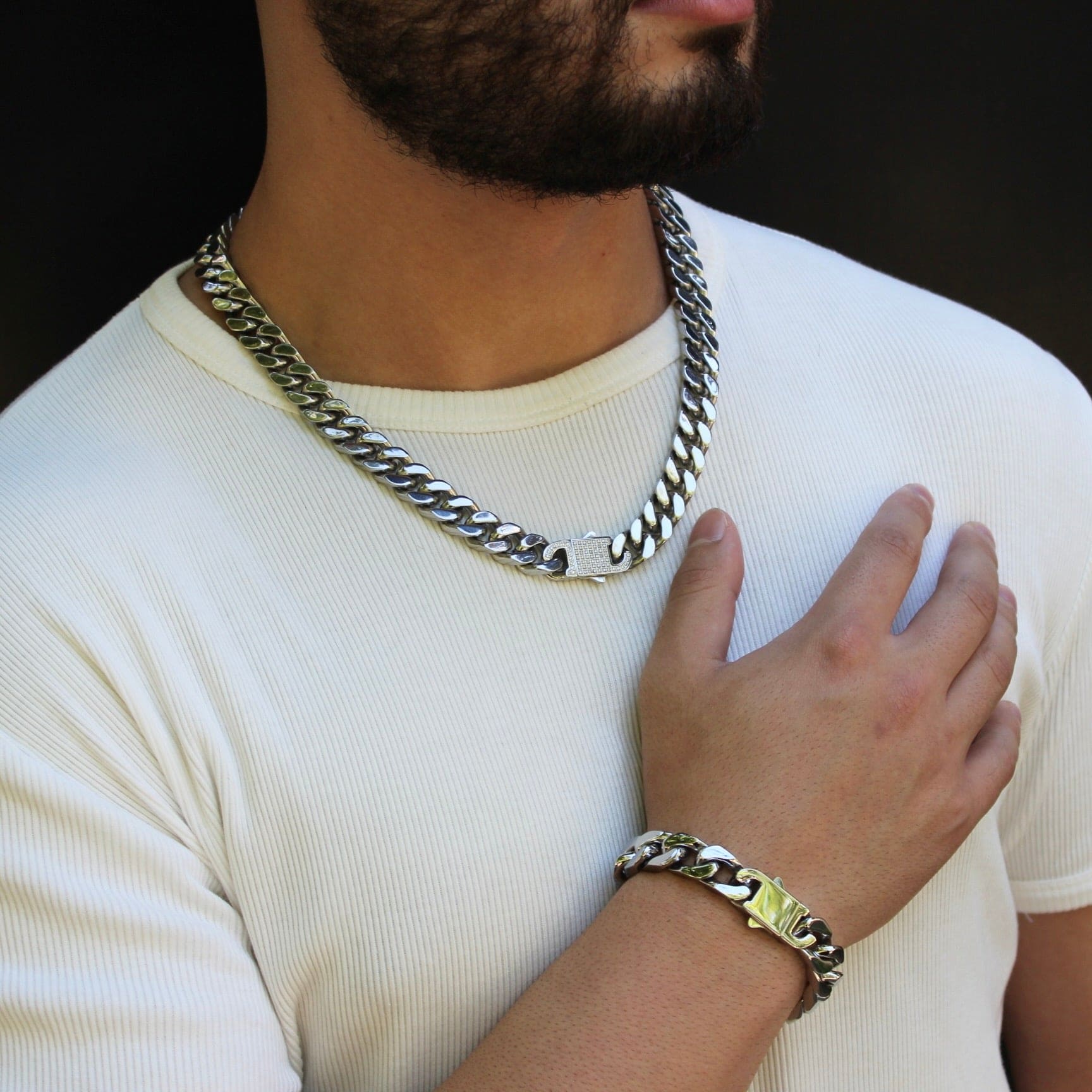 This is a styling shot of our 12mm cuban link chain being paired with a bracelet, to show of how to style the chain