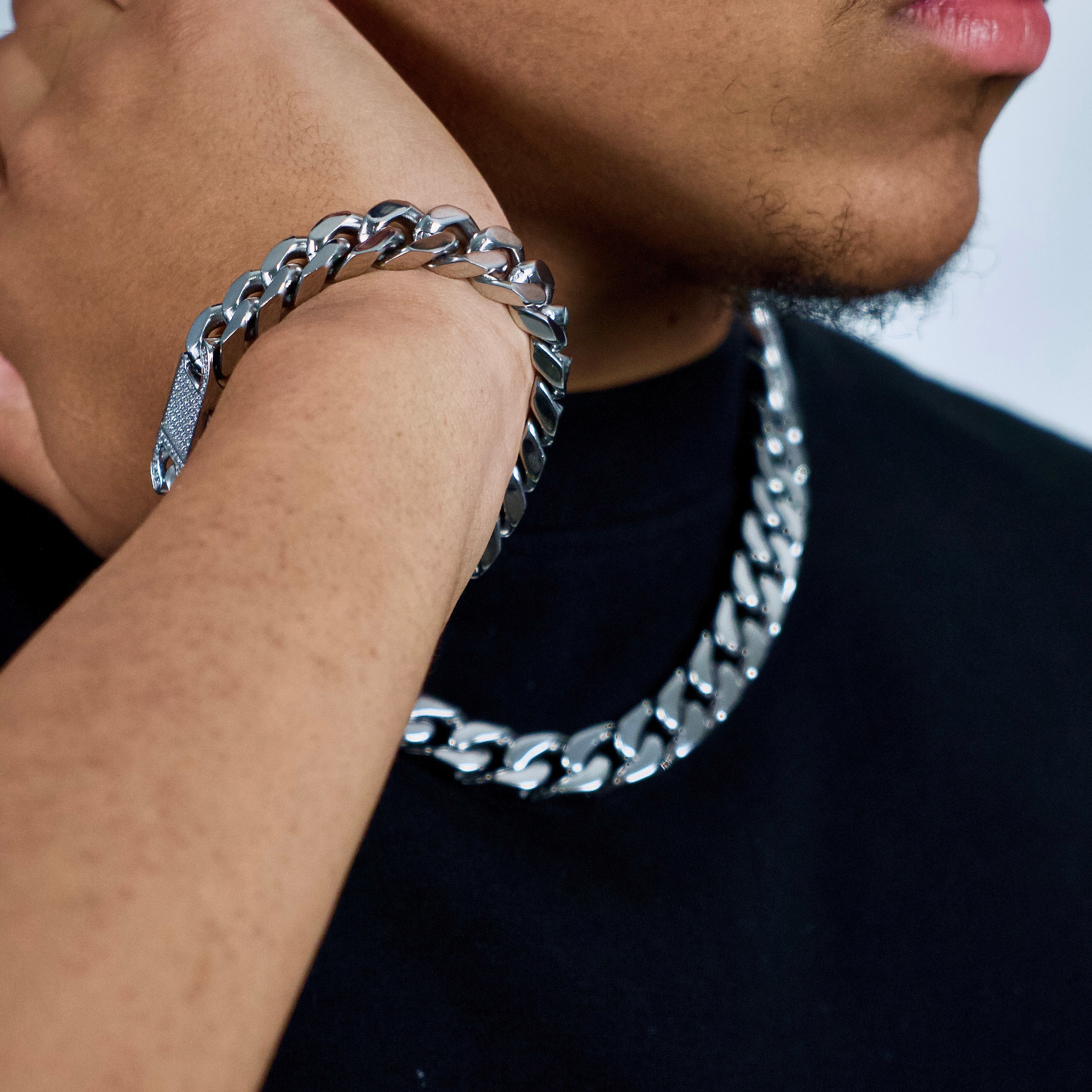 This is a close up shot of the 12mm cuban link chain bracelet with our necklace being displayed in the image aswell