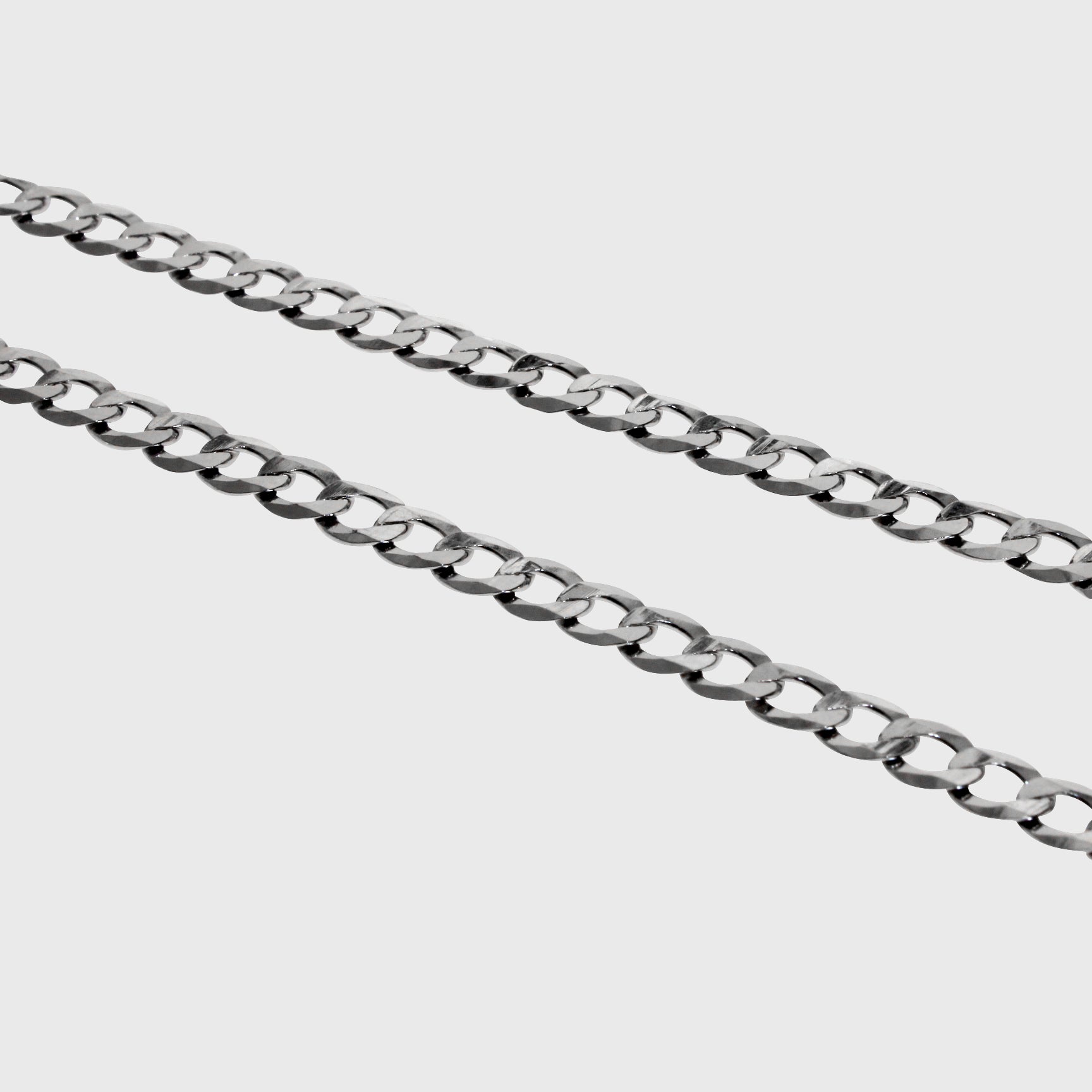 This is product shot taken in a light box of our 5mm sterling silver cuban link curb chain