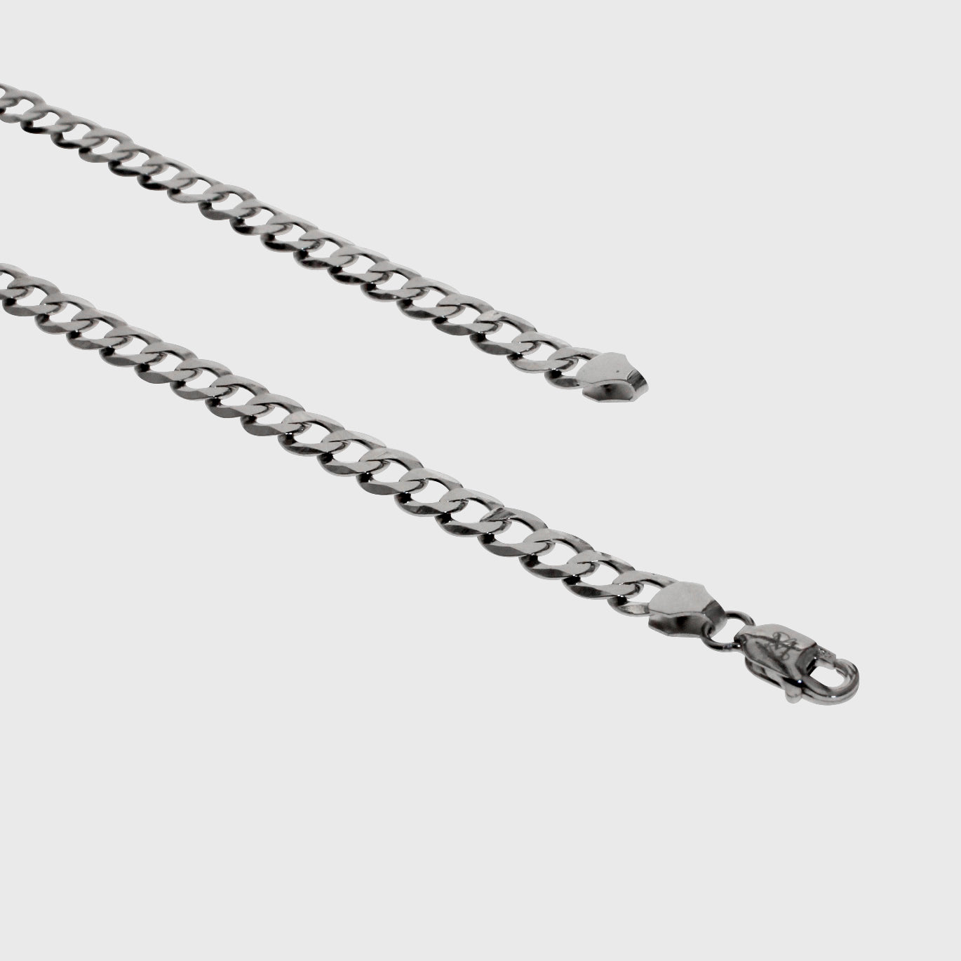 This is a studio product shot of our 5mm sterling silver cuban link curb chain taken in a light box