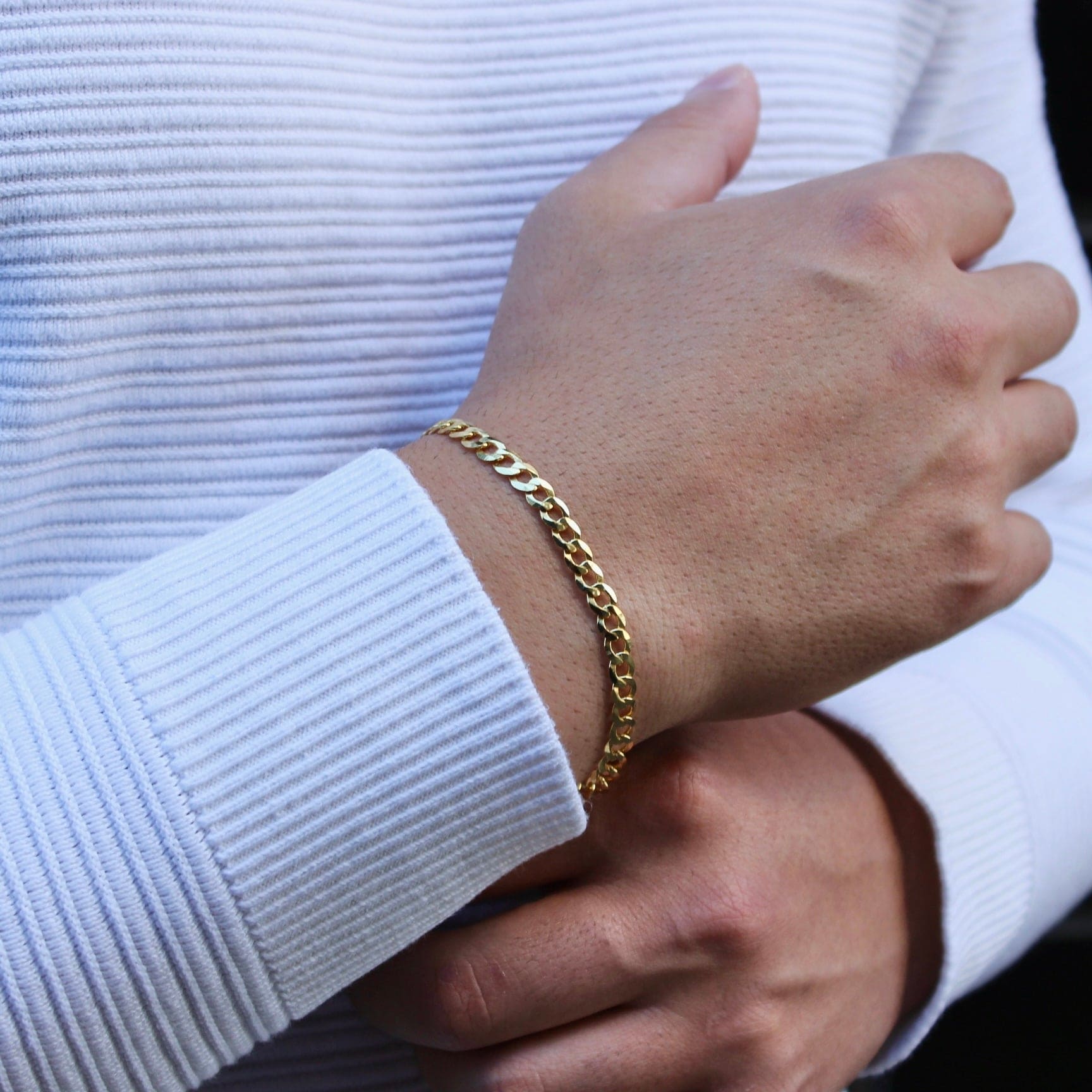 This is a close up shot of our 5mm yellow gold curb link bracelet