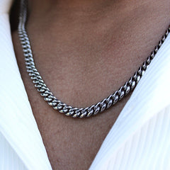 This is an extreme close-up shot of our 6mm cuban link chain being styled 