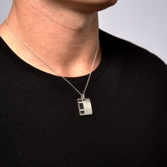 This is a closeup shot of our ignite designer pendant on our models neck