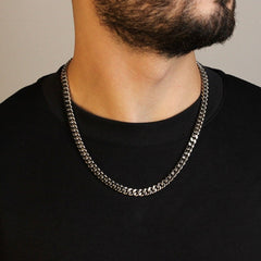 This is a model shot of our 8mm stainless steel cuban link chain on our models neck.