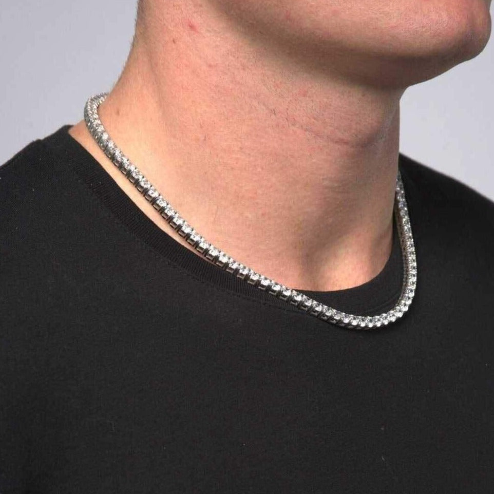 This is a side shot taken in a studio of a model wearing our 5mm Stainless Steel Tennis Necklace